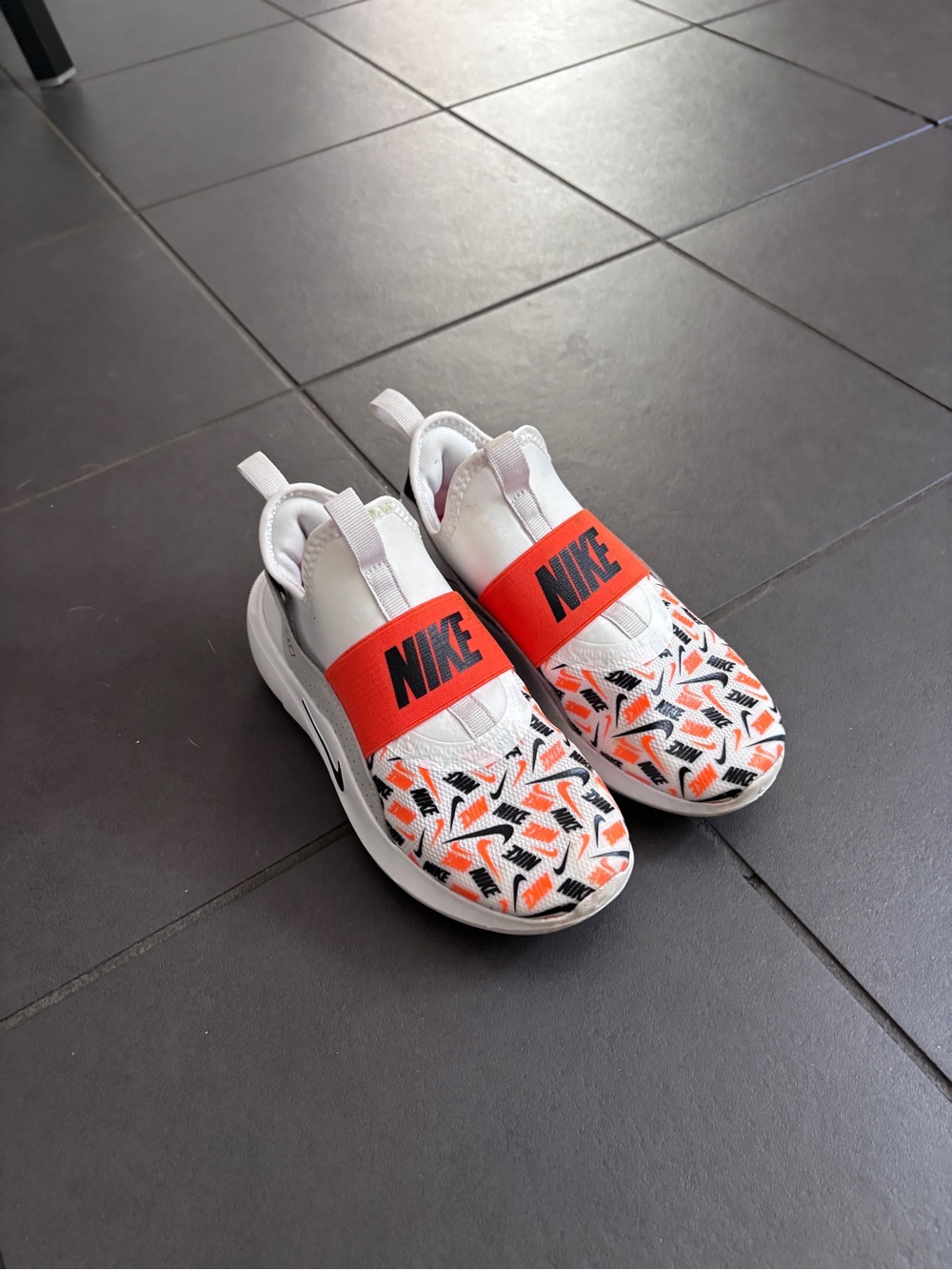Nike kids White & Orange slip on sneakers